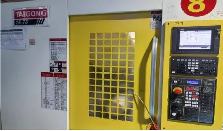 CNC machining equipment on the MIGE production floor
