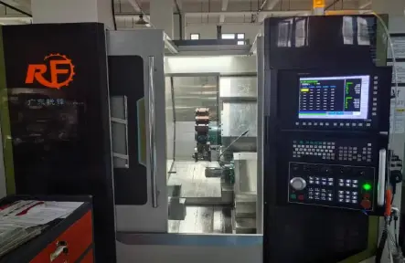 CNC machine and control interface in the MIGE workshop